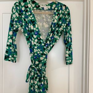 Used but like new- DVF Silk wrap dress. Size 4.